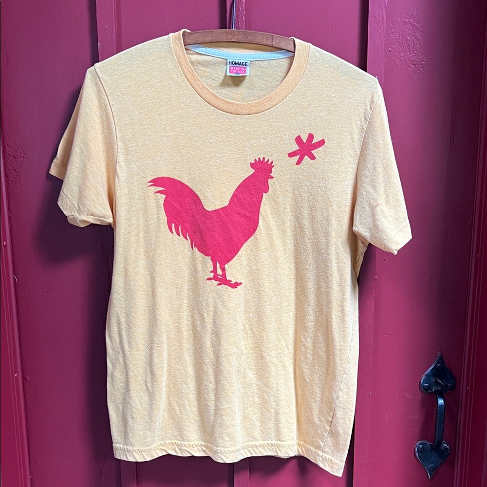 HOMAGE Hot Chicken Takeover Logo Gold Tee with Red Rooster Design
